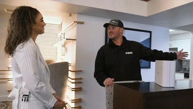 Cold-air diffusers: The latest in scenting technology Fikes employee discussing cold-air diffusers with a customer
