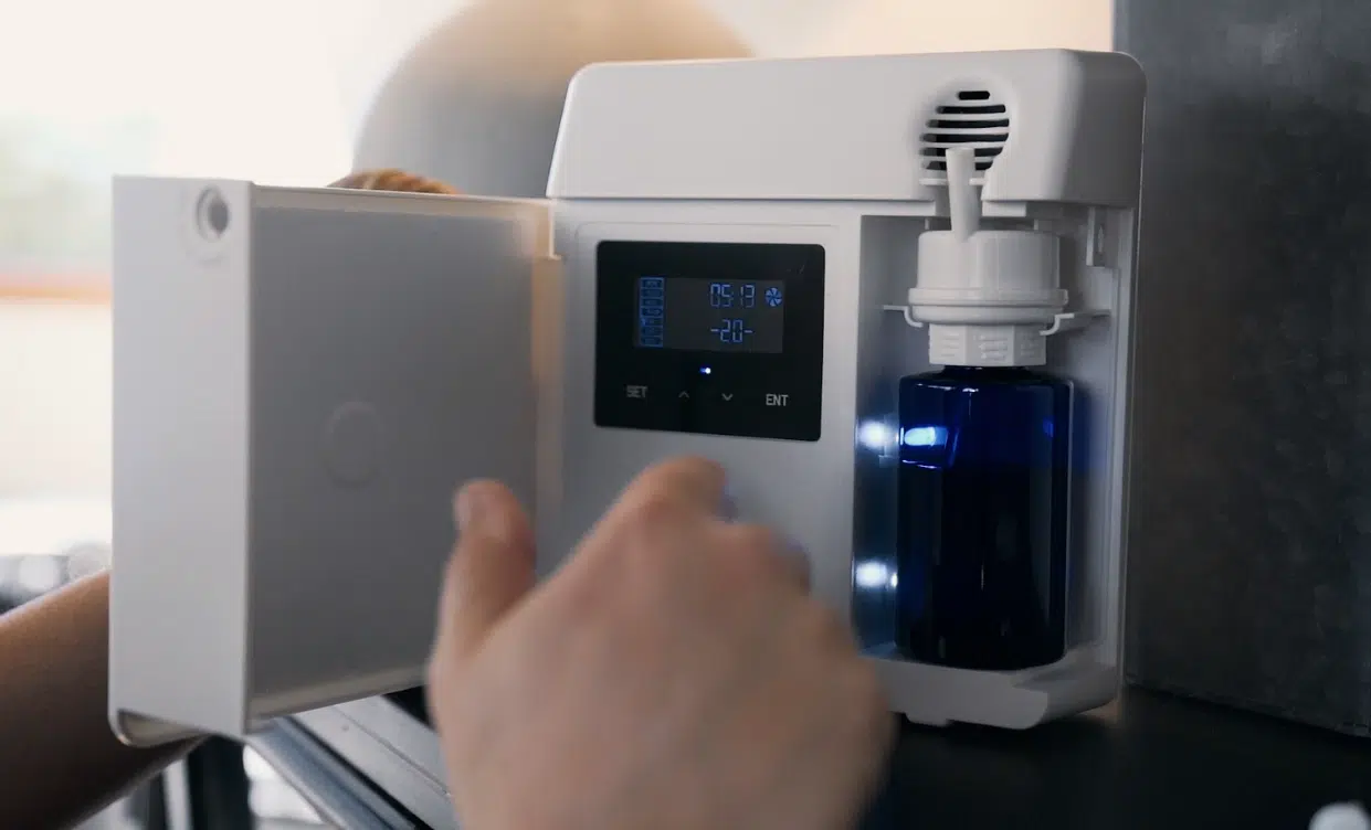 Winter Indoor Living: Ambient Scenting for Comfort & Mood An up close picture of Fikes scenting solution machine