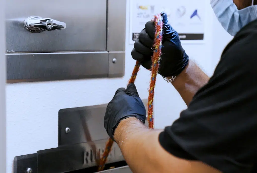 Trash Chute Repair 101: How to Spot Damage Before It Becomes a Safety Hazard man conducting trash chute repair