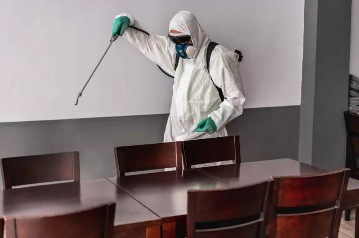 The Modern Pest Control Toolbox: Technology, Monitoring & Data-Driven Prevention Fikes pest control employee spraying a restaurant dining room