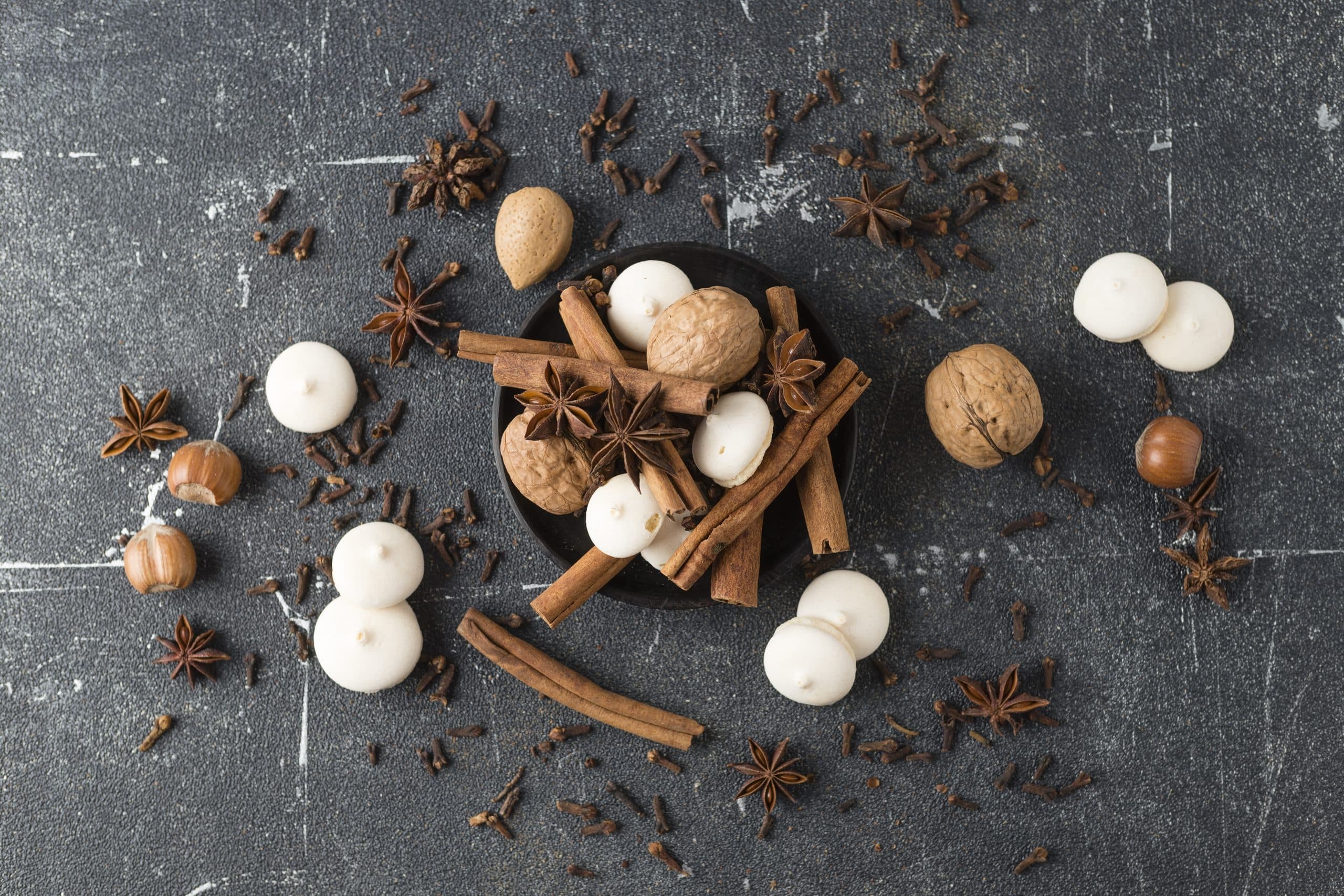 Autumn Scent Branding: How to Use Fall Fragrances to Increase Retail Foot Traffic Spices, nuts and aniseed biscuit on grey ground